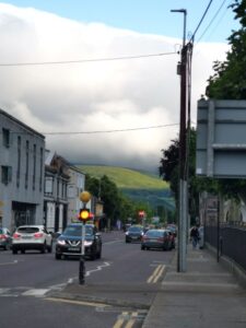 Looking along Prince's Street towards the cloud covered hills of Dingle Peninsula