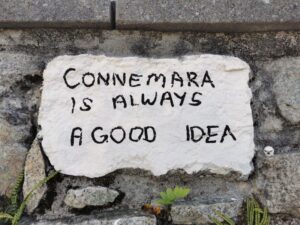 A message on a stone in the wall at the cafe in Roundstone