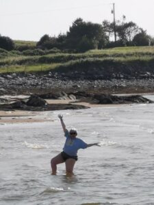 Dionee loving being in the water at Mannin Bay Blueway