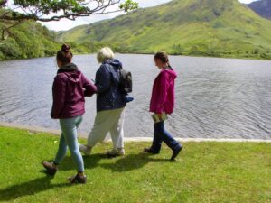 Francesca, Dionee and Matilda walking on the edge of Pollacappul Lough