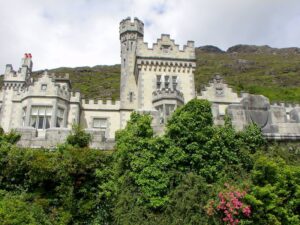Looking up towards Kylemore Abbey and the hills above and from the road below