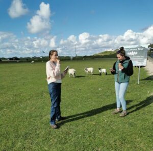 Matilda and Francesca enjoying an ice-cream on the greenbelt near Dugort Beach, Achill Island