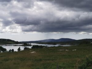 Storm-clouds over a waterway on the way to Roundstone