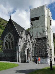 The neo-Gothic cathedral like church at Kylemore Abbey wrapped during renovation