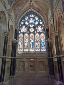 The stained glass windows in a side nave at the church at Kylemore Abbey