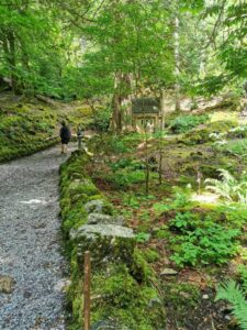 The walkway to the mausoleum coming of the main trail to the church at Kylemore Abbey