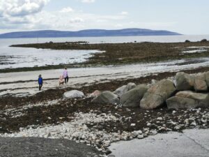 Walking on the beach near Bearna Harbour