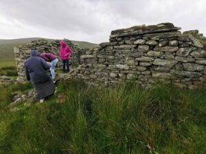 Dionee, Francesca and Matilda in one of the Deserted Village Houses.