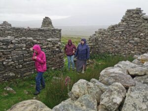 Matilda, Dionee and Francesca in one of the houses at the Deserted Village, Achill Island