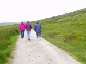 Matilda, Francesca and Dionee walking towards the deserted village Achill Island
