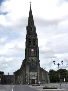 The very high steeple at the Cathedral of the Annunciation of the Blessed Virgin Mary and St Nathy Ballagharreen