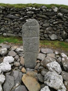 A buriel stone alongside the Gallarus Oratory