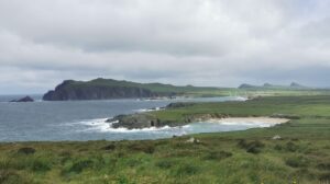Clogher Strand (beach) Sybil Sibéal Head and the Three Sisters peaks as seen from Ceann Sratha parking place