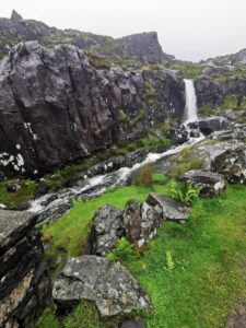 Conor Pass waterfall and the river rushing down the mountainside, Dingle Peninsula