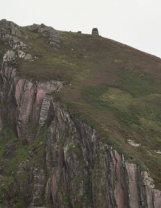 Eask Tower on the top of the cliffs near the entrance to Dingle Bay