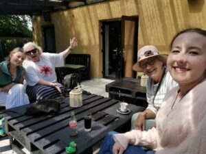 Enjoying a break in our travels in the garden bar at Tomásíns Bar & Restaurant Dingle Peninsula