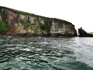 The cliffs and rock pinnacle in Dingle Bay - a mini lighthouse used to sit on the rock