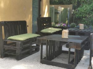 Tomásíns Bar & Restaurant and the makeshift furniture in the sunny garden bar
