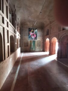 A corridor of light and arches leading to the ancient door in the Ramgarhia Bunga at the Golden Temple