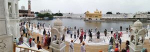 A panoramic view of the Sri Harmandir Sahib Golden Temple complex seen from the entrance steps