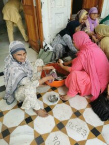 Everyone helps in the Langar hall