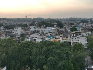 The view over Amritsar in the fading light of evening seen from the hotel rooftop bar