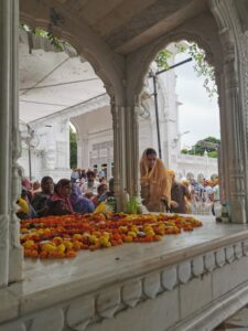 White marble platform where pilgrims and visitors to the Golden Temple place flowers