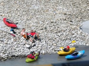 Kayakers taking a rest by the riverside - Himalayan India