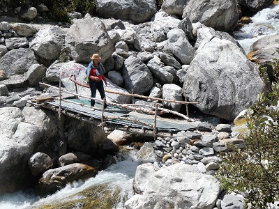 The four trekers resting at the base camp Gangaria, Valley of Flowers, Himalayan India