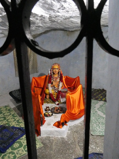 Statue in the cave under the 2000 year old Mulberry tree - where Sri Adishankaracharya meditated - Joshimath, Himalayan India