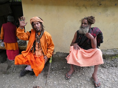 Sadhu's (wandering saints) near the rock bridge Mana village