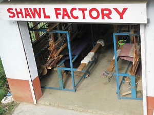 Where the shawls are hand made on the looms - beneath the shop, Kuasani, Himalayan India