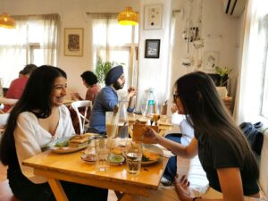 Customers enjoying the tea house in Hauz Khas complex