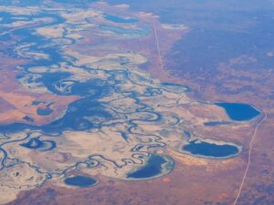 Flying over Australia on the way to India after rains fill the lakes