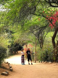 Kaya and Manfred enjoying watching the squirrels in a tree in Sanjay Van Park