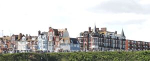 Iconic buildings, homes, hotels and holiday accommodation on the shorefront at Cromer Norfolk