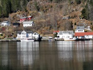 A small village on the edge of the fjord near Bergen