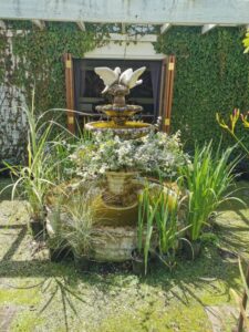 A fountain in the gardens at Mia Flora