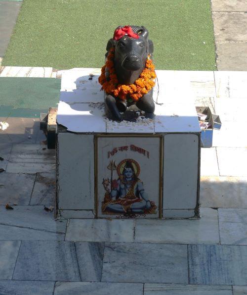 A statue of Nandi, Shiva's bull outside the small temple Hatkoti
