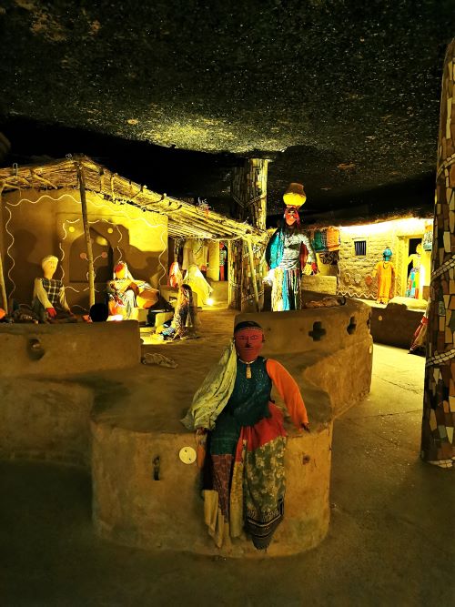 Inside one of the internal sculpture rooms where replica rooms in homes, people and clothing are on display at the Rock Garden Chandigarh