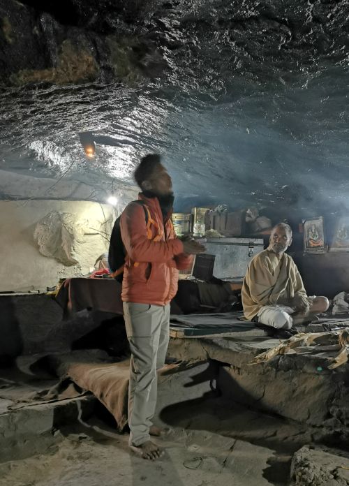 Kartik talking with one of the Yogi's in the Pandava Gufa