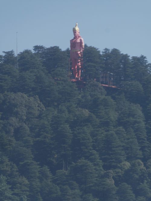 The Hanuman statue rising out of the trees on Jakhu Hill above Shimla