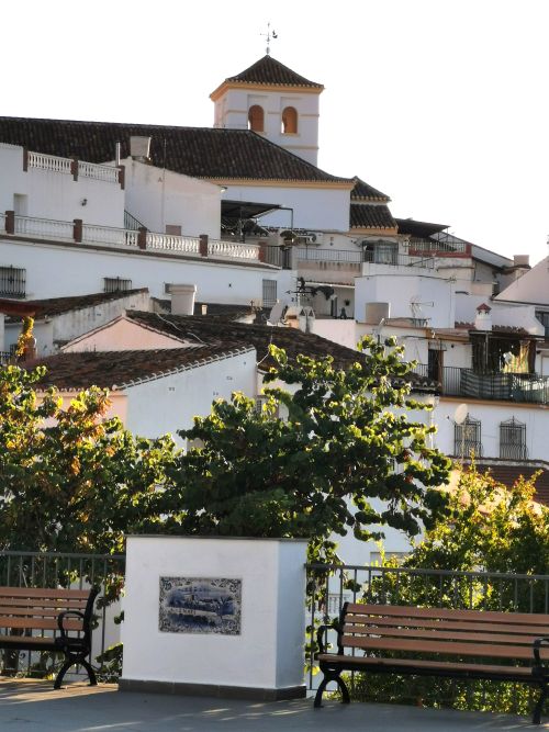From the terrace in Iznate looking up to the church on the hill