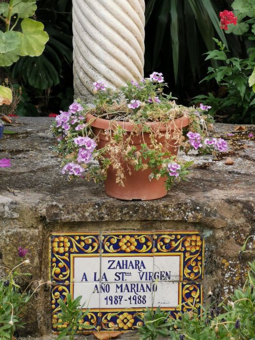 The name at the bottom of the statue beside The Iglesia de Santa Maria de la Mesa (Church of St Mary) Zahara de la Sierra