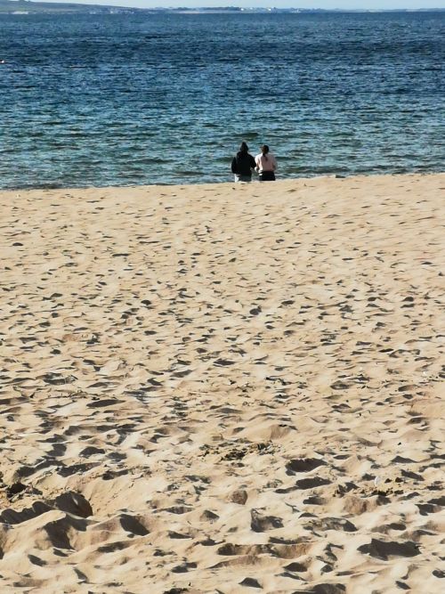 Francesca and Matilda on the waters edge at Dugort, Achill Island