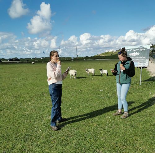 Matilda and Francesca enjoying an ice-cream on the greenbelt near Dugort Beach, Achill Island