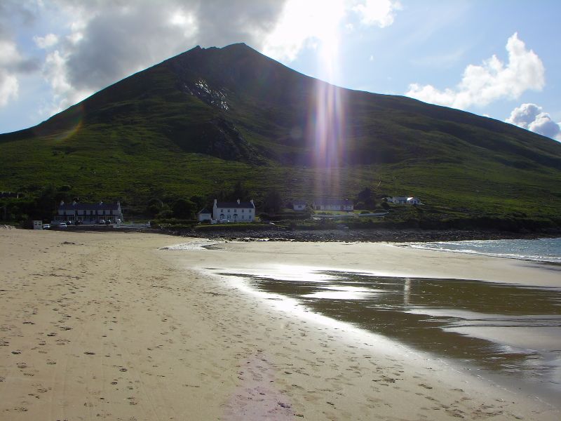 Slievemore in the early evening sun with the tide out at Dugort beach