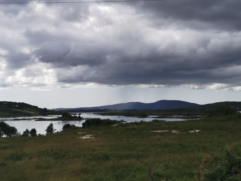 Storm-clouds over a waterway on the way to Roundstone