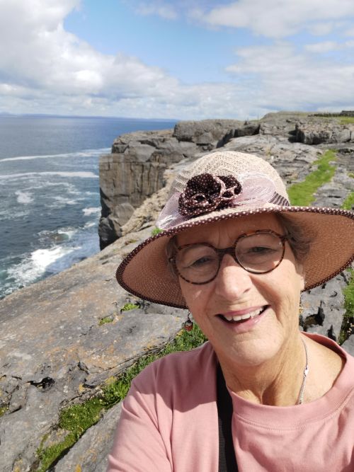 Teresa on the Cliffs in The Burren high above the ocean
